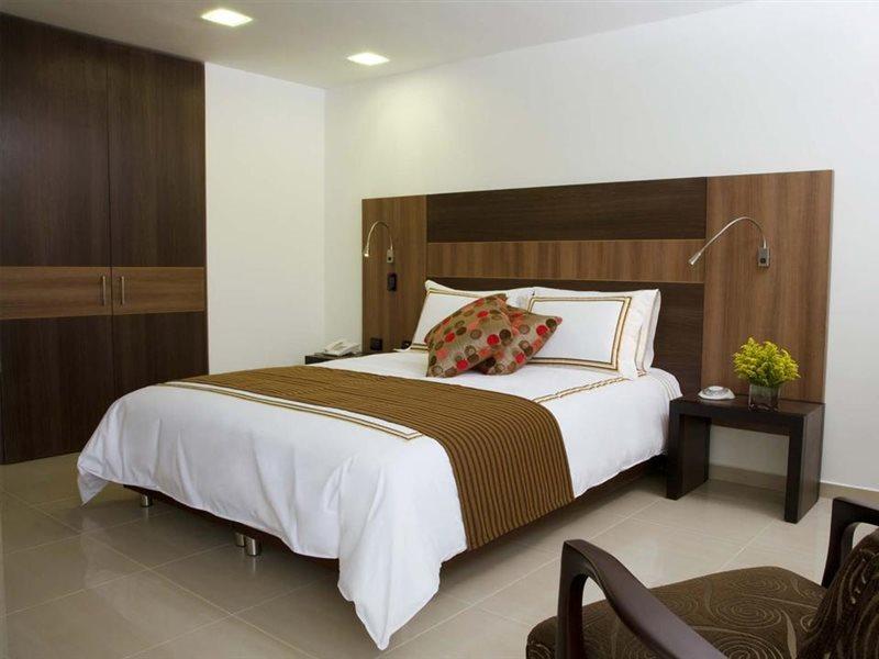 San Simon Hotel Pereira By Soratama Eksteriør bilde A bedroom