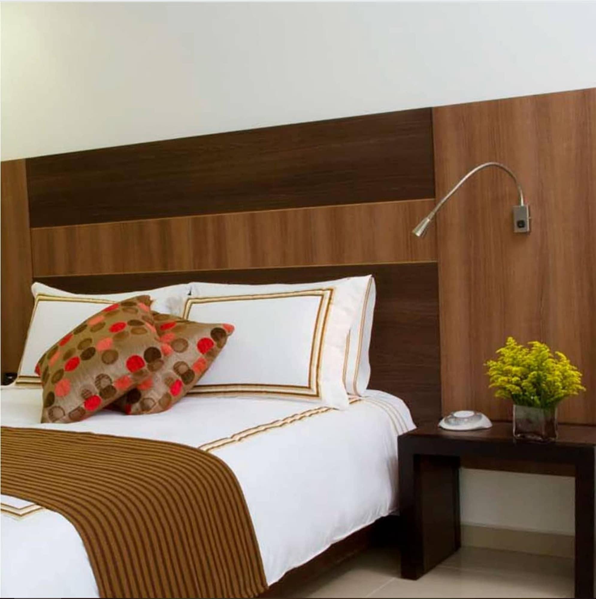San Simon Hotel Pereira By Soratama Eksteriør bilde A wall mounted reading light