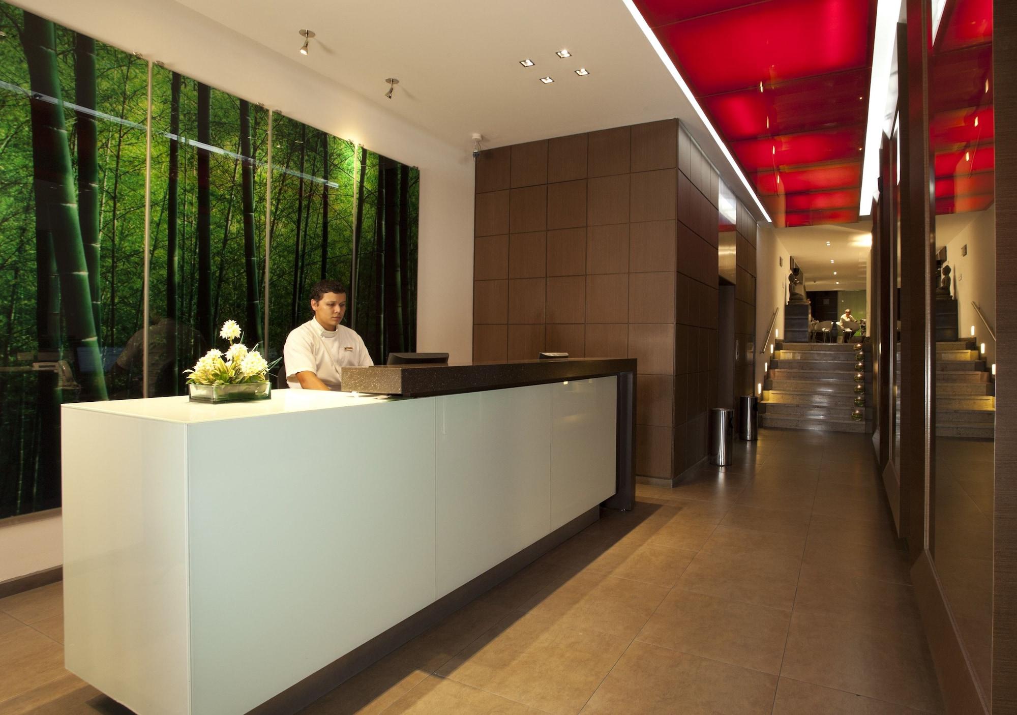 San Simon Hotel Pereira By Soratama Eksteriør bilde The reception area of the hotel