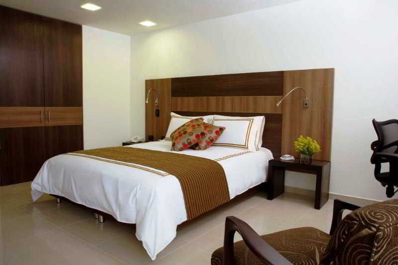 San Simon Hotel Pereira By Soratama Eksteriør bilde A bedroom